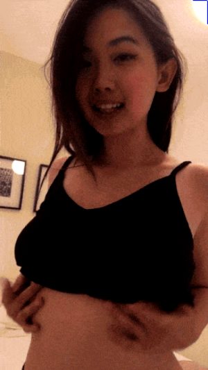 Sexy asian babe show tits